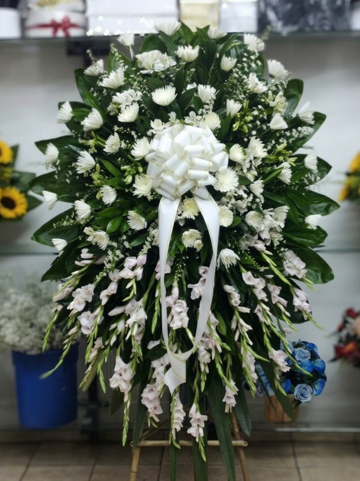 mis condolencias — florería CaliFloral Cali